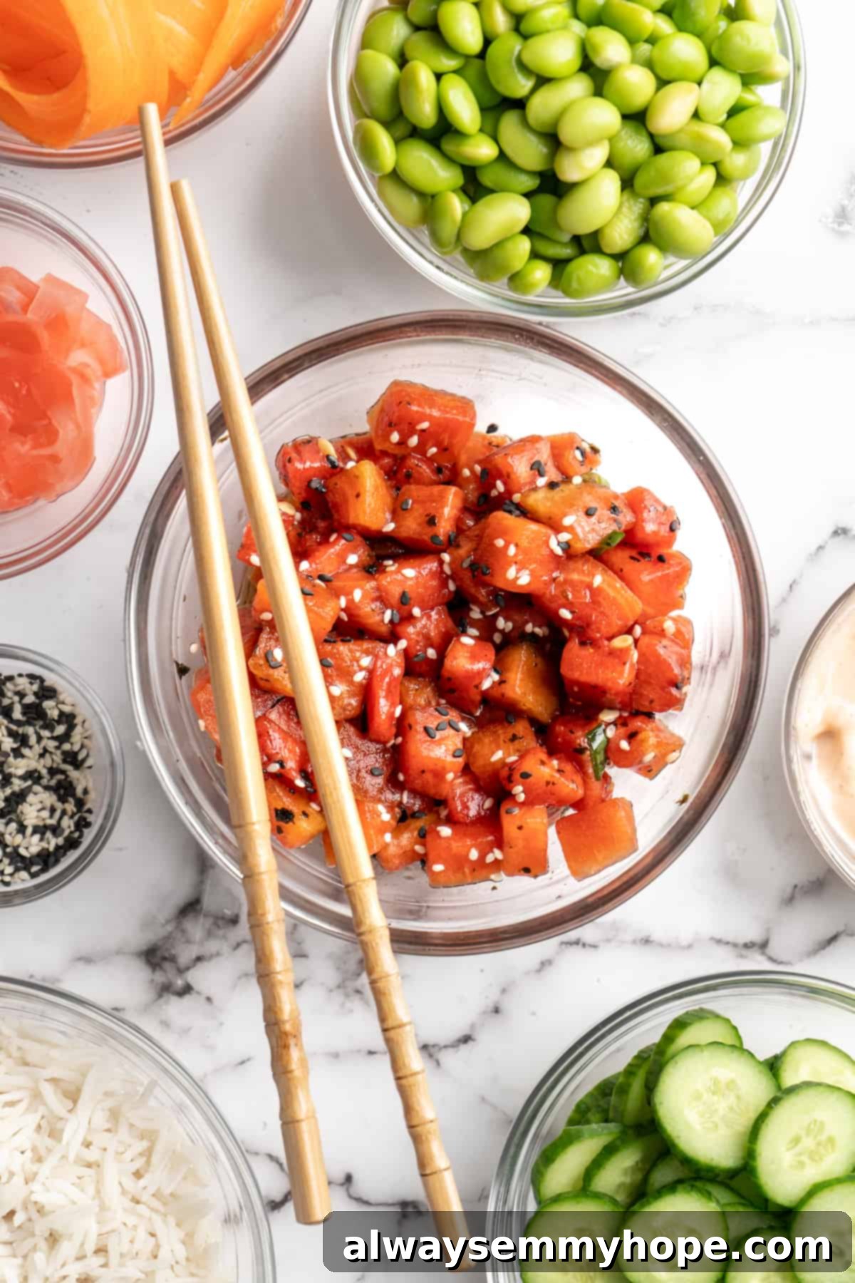 Discover the magic of transforming watermelon into a delicious and convincing vegan ahi tuna substitute. This recipe makes plant-based eating both easy and exciting. Vibrant vegan watermelon tuna cubes in a glass bowl, ready for a delicious poke bowl, surrounded by fresh ingredients like avocado, cucumber, and rice.