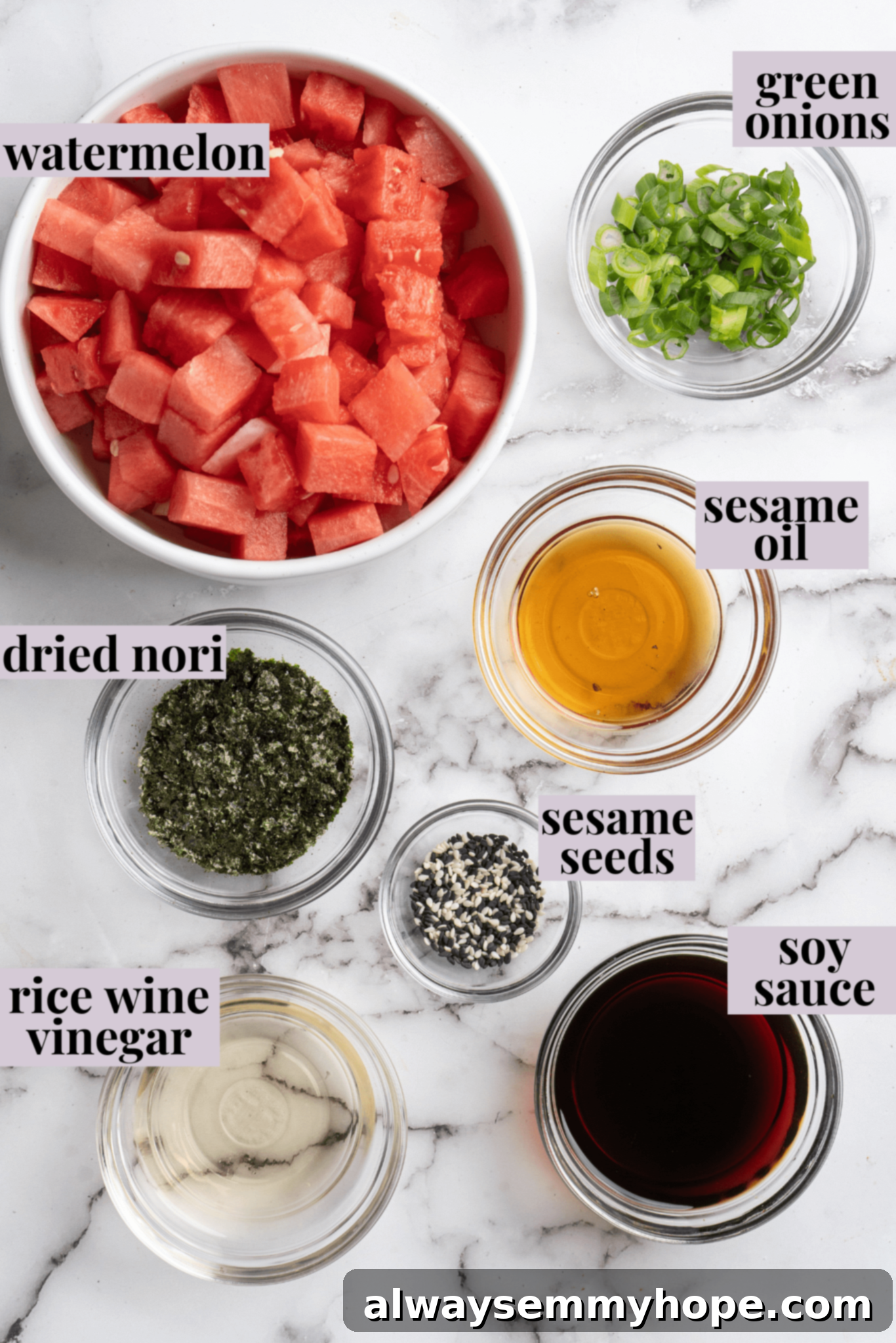 Experience the astonishing ease of transforming fresh watermelon into a fantastic plant-based ahi tuna substitute, offering a taste remarkably close to the original. A collection of fresh ingredients laid out, including cubed watermelon, green onions, nori sheets, and various sauces, for making vegan tuna.