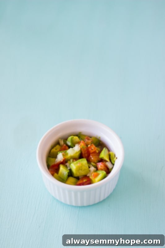 Mexican Breakfast Tacos are a hearty breakfast packed with hash potatoes, eggs and avocado pico de gallo salsa. Fresh and zesty! Pico De Gallo Salsa in a ramekin.