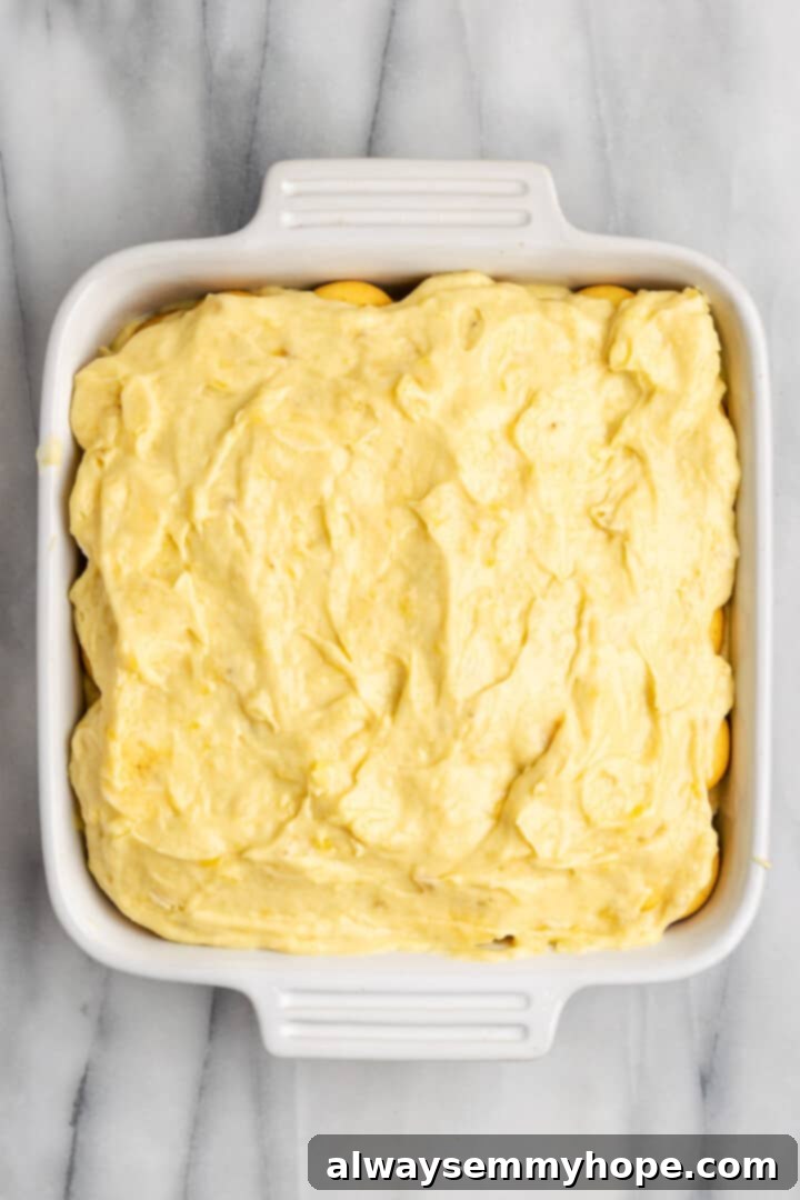 Fully assembled vegan banana pudding in baking dish before adding final whipped topping