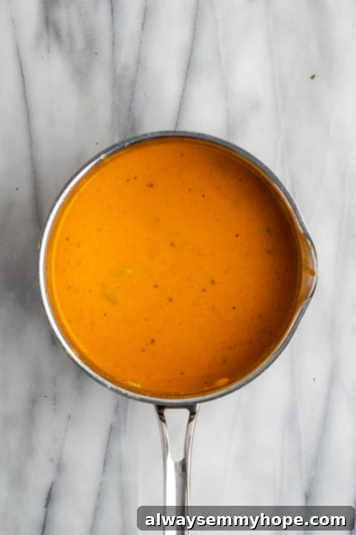 Overhead view of malai kofta sauce in pan