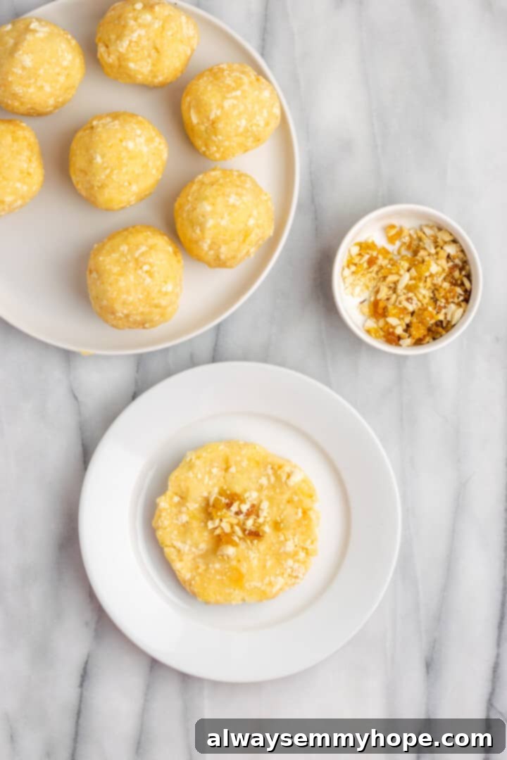Overhead view showing filling being added to malai kofta dumpling