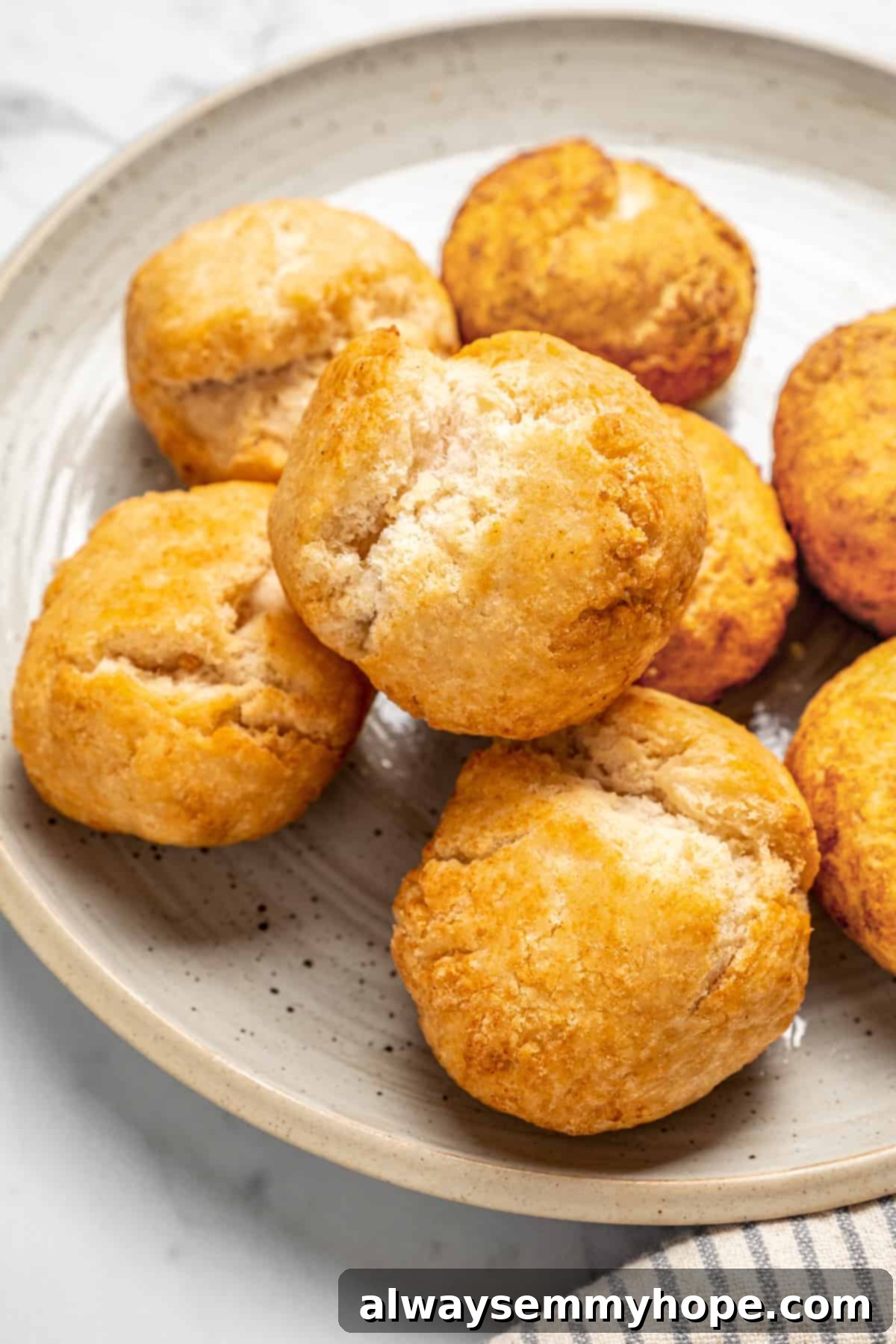 Vegan Jamaican fried dumplings stacked on plate