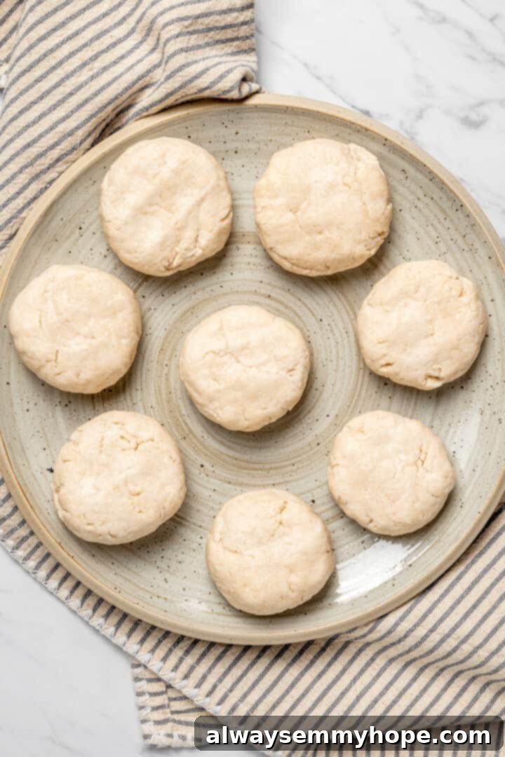 Overhead view of flattened dough balls for Jamaican dumplings