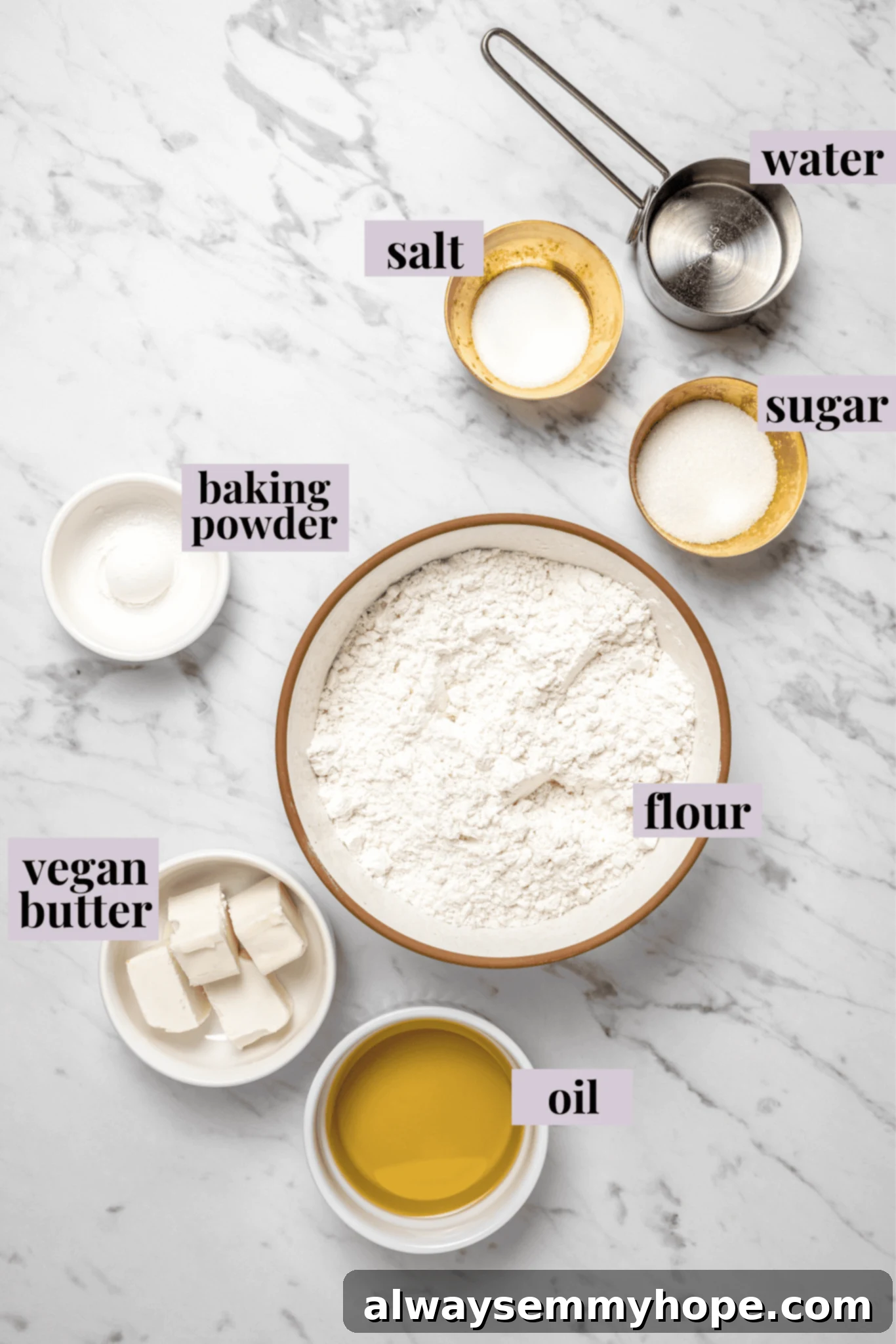 Overhead view of ingredients of Jamaican fried dumplings with labels