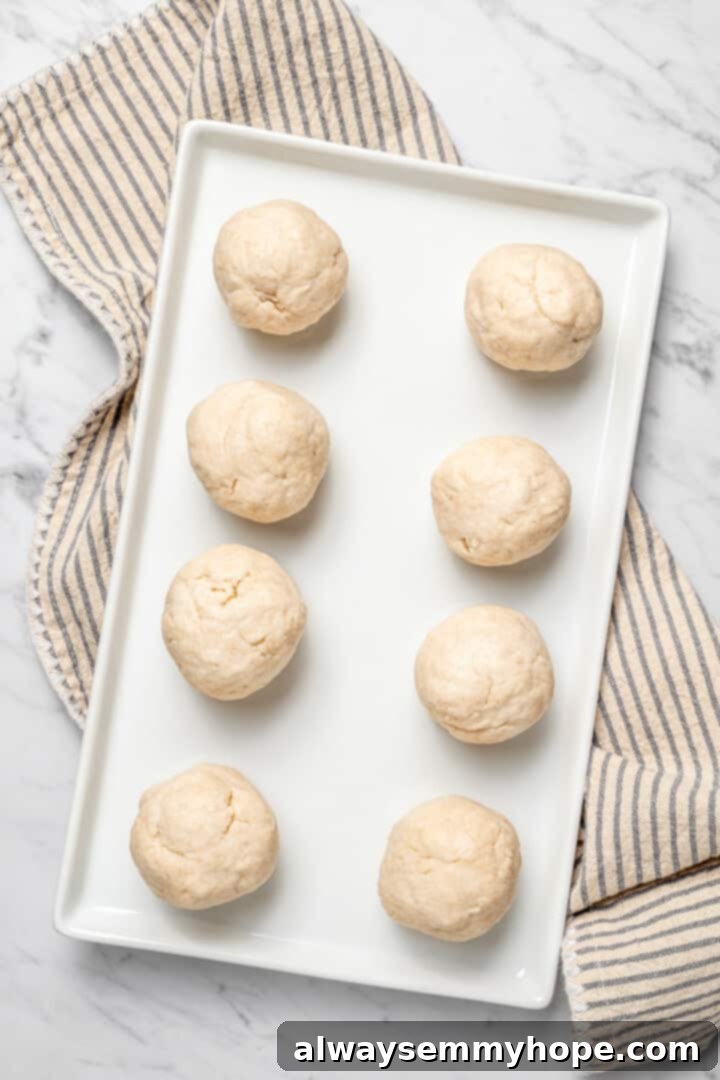 Overhead view of balls of dough for making Jamaican fried dumplings