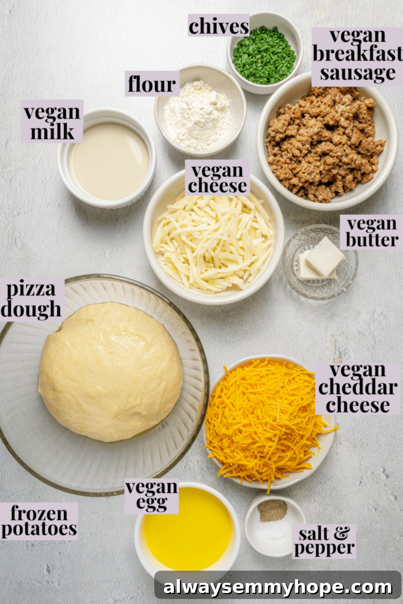 This vegan breakfast pizza features plant-based eggs, cheese, hash browns, and sausage, all baked on a crispy, chewy crust. So good! An overhead shot showcasing all the fresh and packaged ingredients laid out for making vegan breakfast pizza, including pizza dough, plant-based eggs, vegan cheese, hash browns, and sausage.