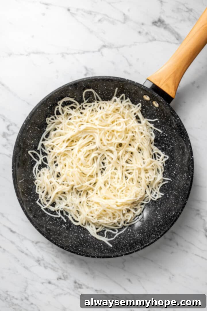 Overhead view of hearts of palm pasta in skillet