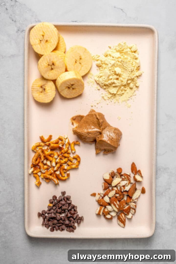 Fuel Your Day: Easy & Delicious Vegan High-Protein Overnight Oats (4 Flavors!) Overhead view of ingredients for almond butter pretzel high-protein overnight oats