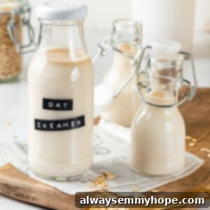 3 glass bottles of oat milk coffee creamer