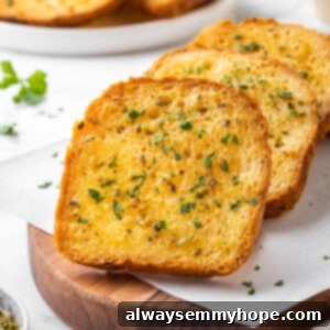 3 slices of Texas toast on parchment-lined wood board
