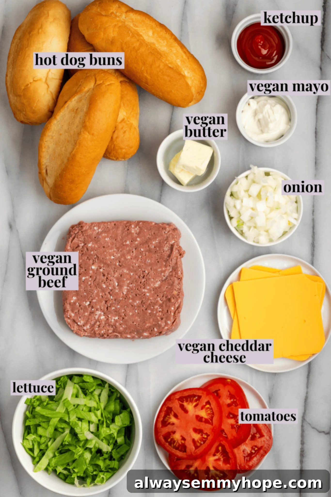 The chopped cheese sandwich is a NYC classic—and now you can make your own vegan version at home! You'll love this easy, delicious recipe. Top view of various Vegan Chopped Cheese Ingredients laid out on a surface