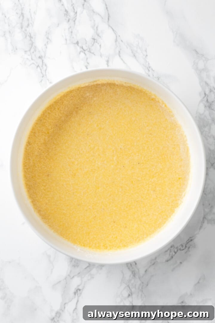 Overhead view of buttermilk pie filling in mixing bowl