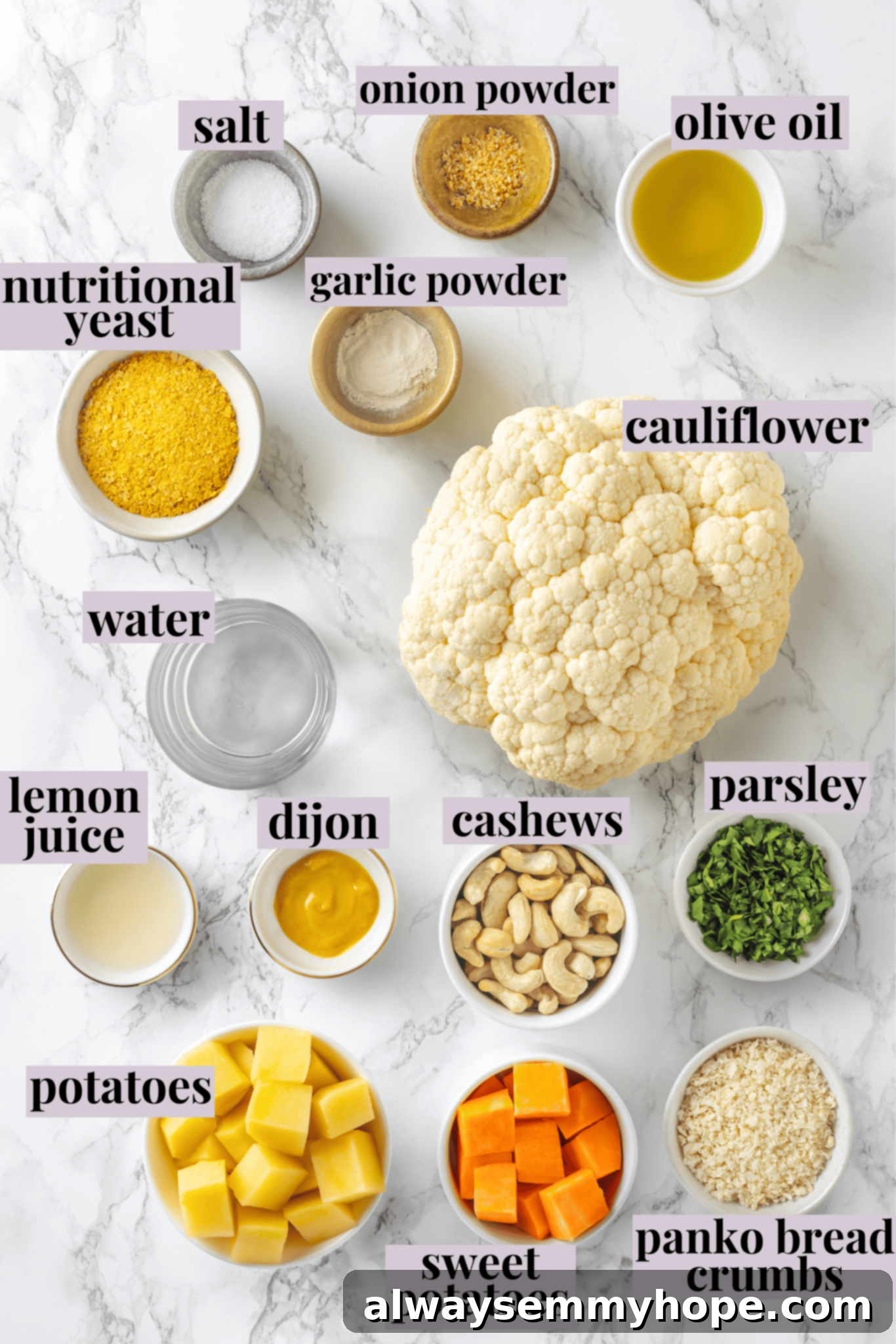 Overhead view of various fresh ingredients for vegan cauliflower mac and cheese, neatly labeled for easy identification.