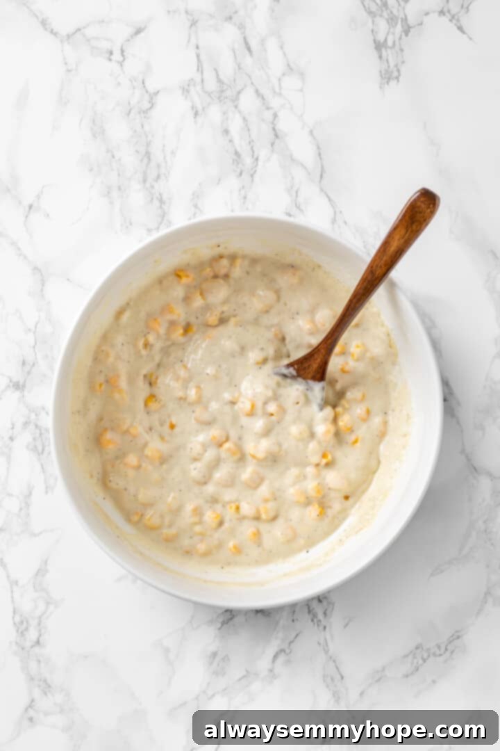 Overhead view of corn nugget batter in bowl