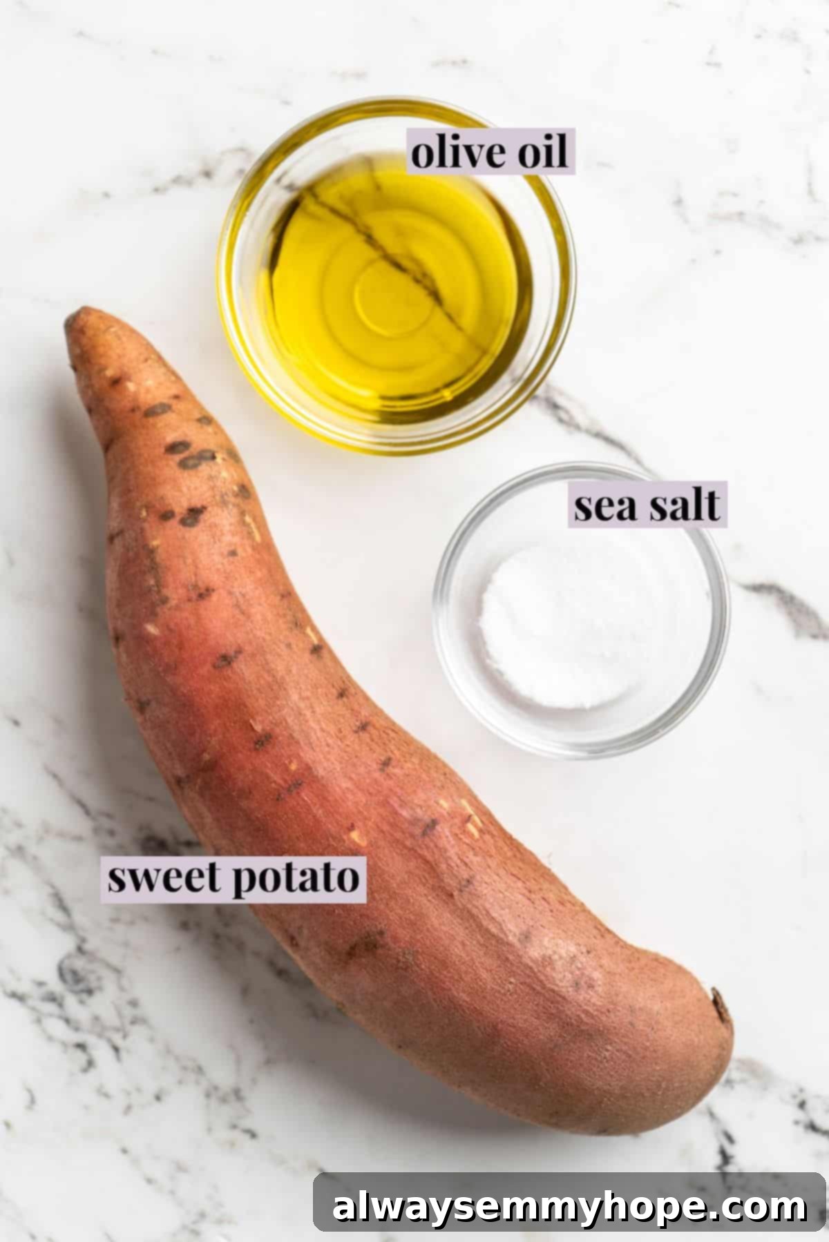 Once you start eating these crispy homemade sweet potato chips, you won’t be able to stop! Super easy to make with only 3 ingredients. Overhead view of fresh sweet potato, flaky sea salt, and olive oil - key ingredients for our sweet potato chips