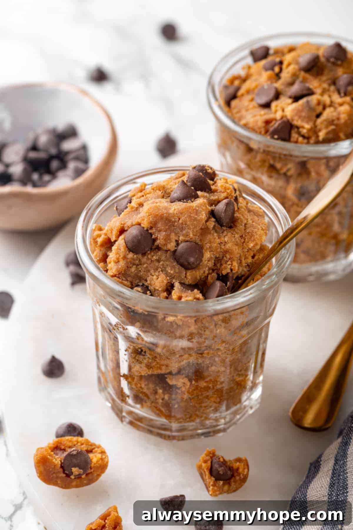 Two jars of chocolate chip protein cookie dough