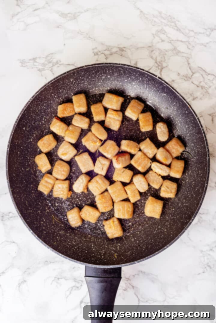 Overhead view of cauliflower gnocchi in skillet