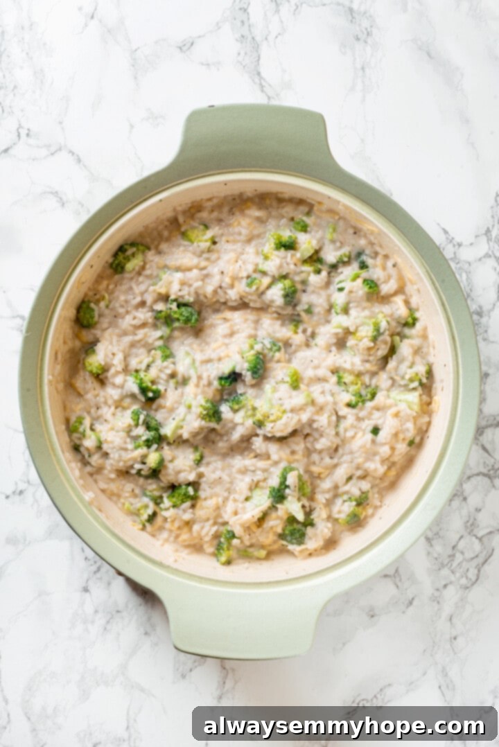 Overhead view of broccoli cheese rice casserole mixture in pot