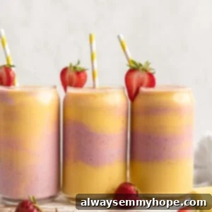 3 glasses of strawberry mango smoothie on board