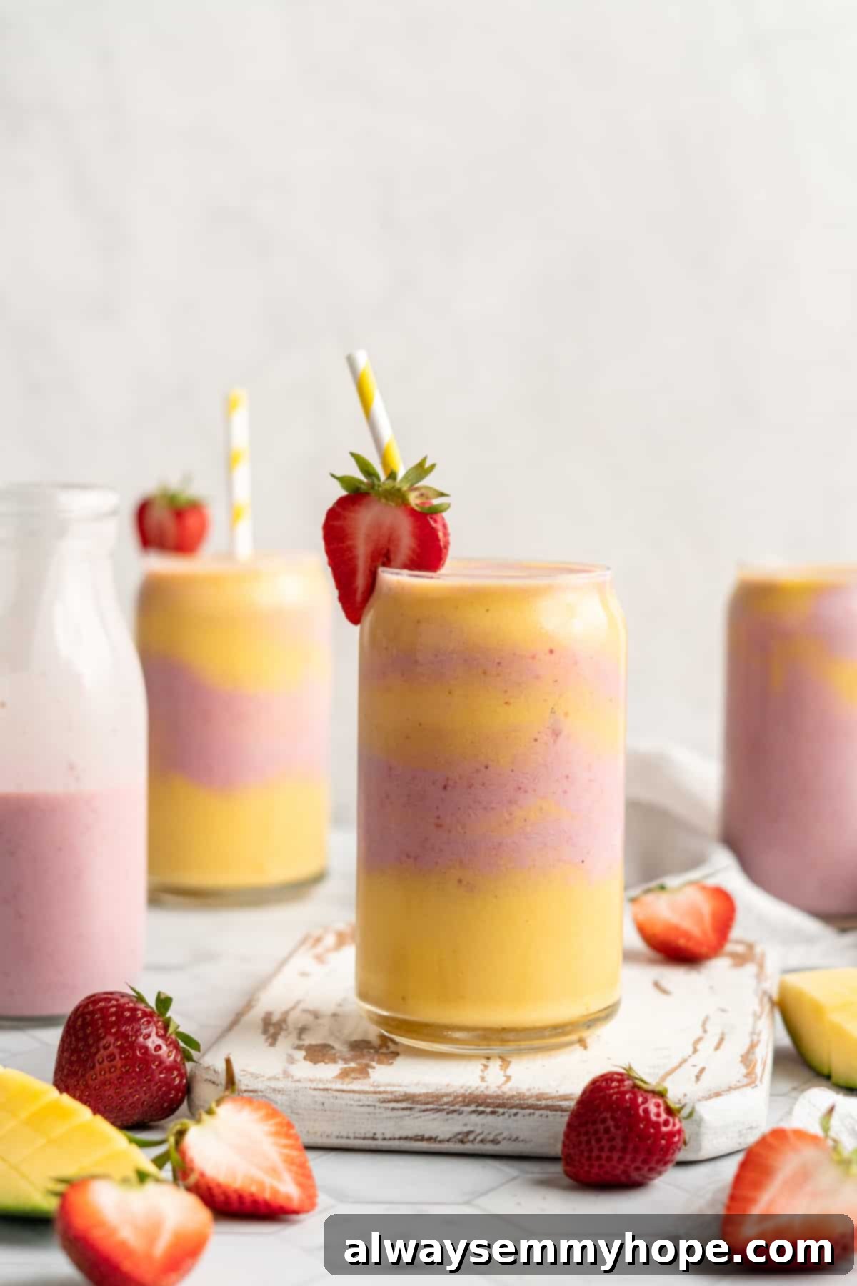 Glasses of strawberry mango smoothie