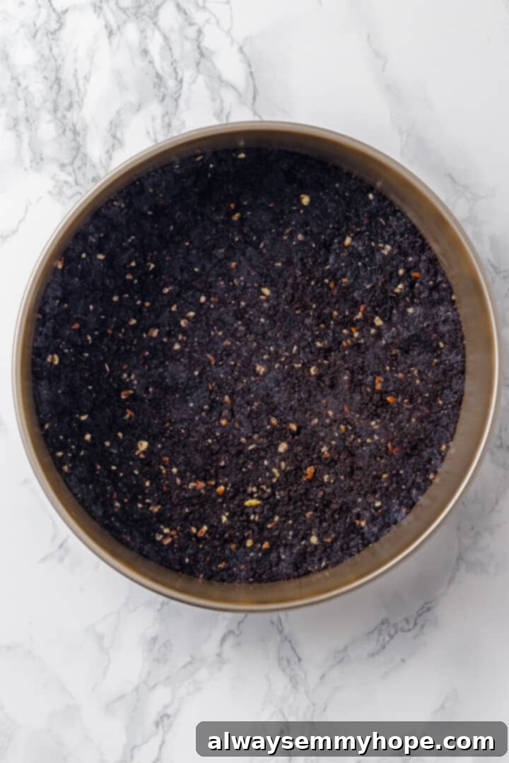 Overhead view of Oreo pecan crust in pan