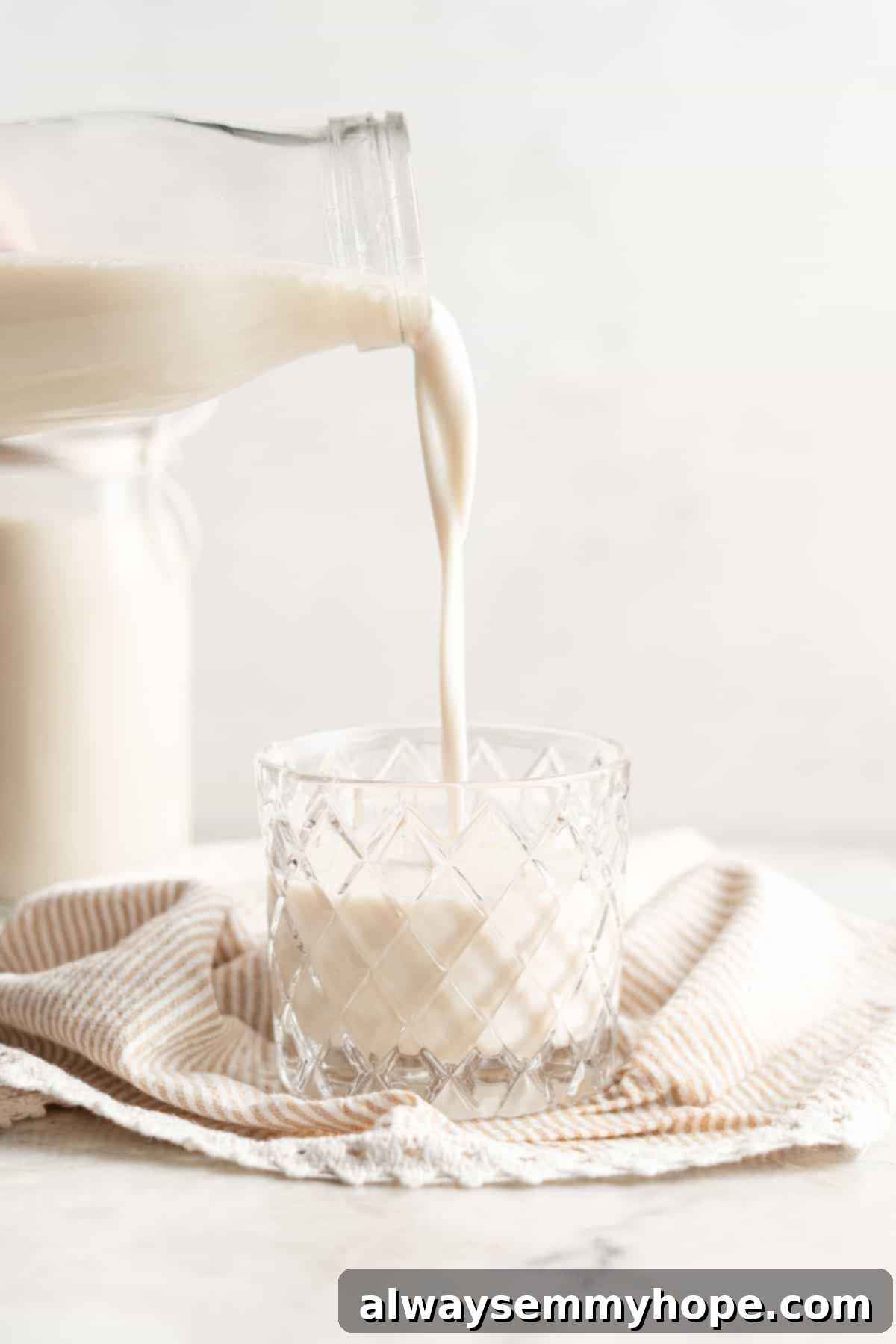 Pouring soy milk into a glass
