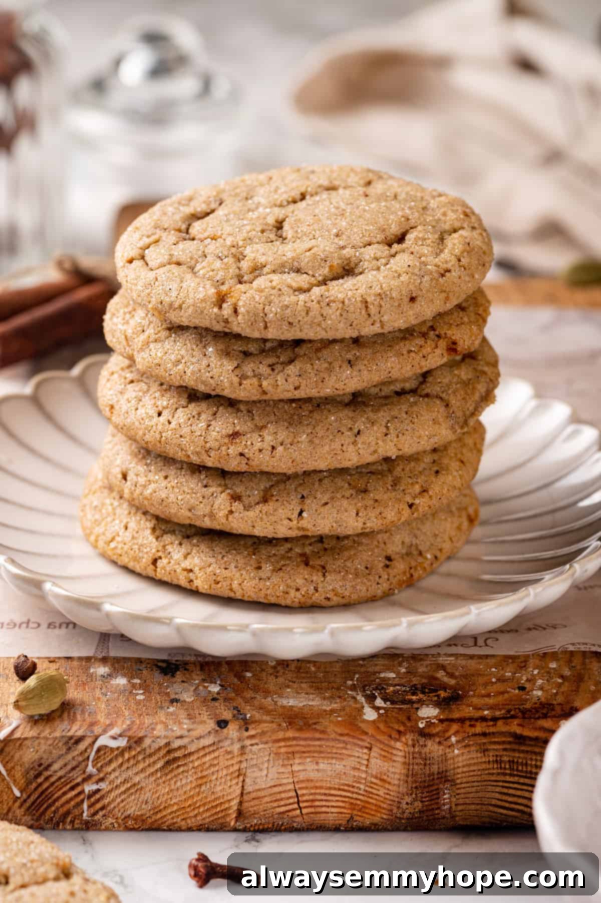 Stack of freshly baked vegan chai sugar cookies on a plate, ready to be enjoyed