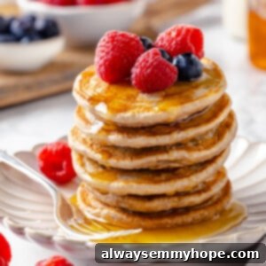 Vegan silver dollar pancakes stacked on plate