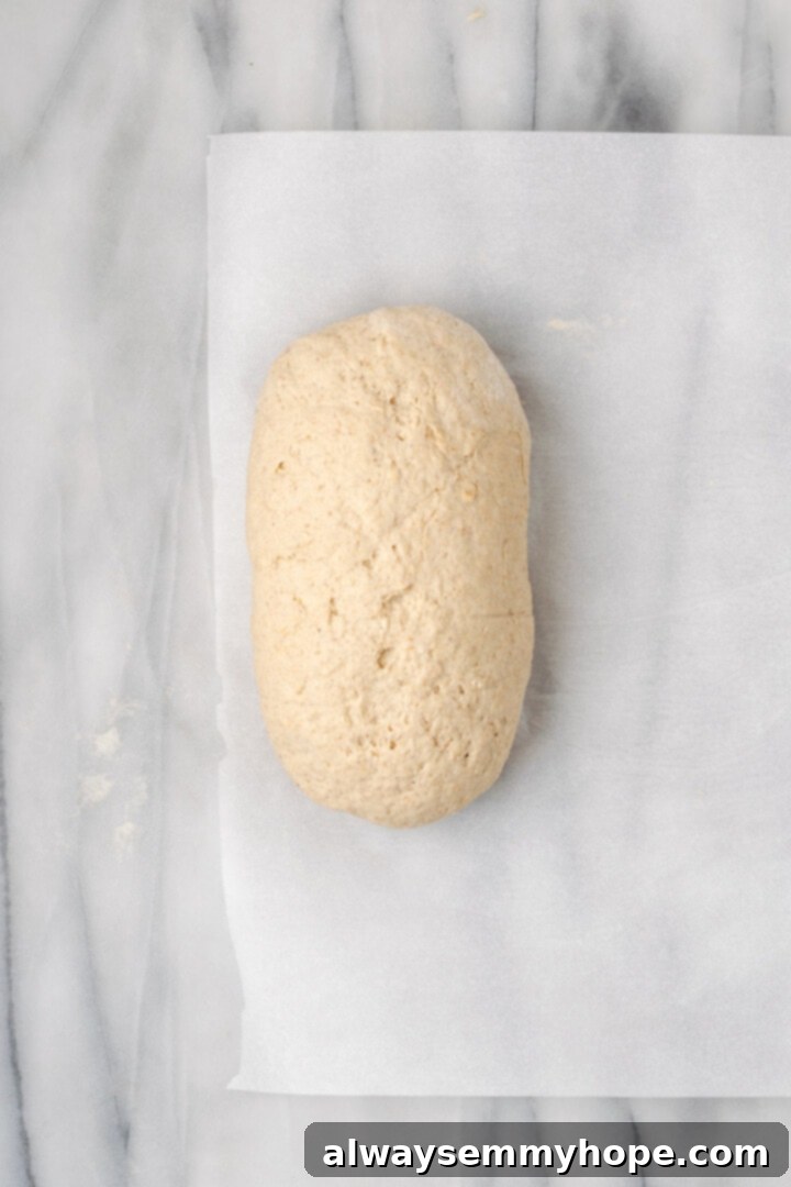 Overhead view of gluten-free bread dough on parchment paper