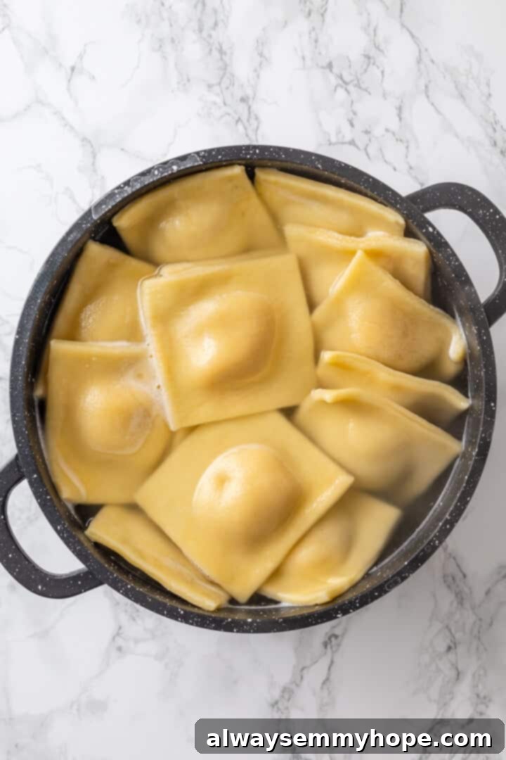 Butternut squash ravioli is fun to make at home and the results are delicious. Tender pasta pockets filled with creamy, caramelized squash! Boiled ravioli in colander