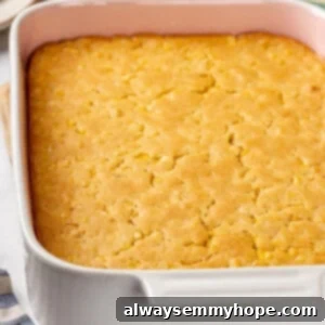 Fluffy Corn Soufflé 2 Close-up of baked vegan corn soufflé in a round baking dish with a golden crust