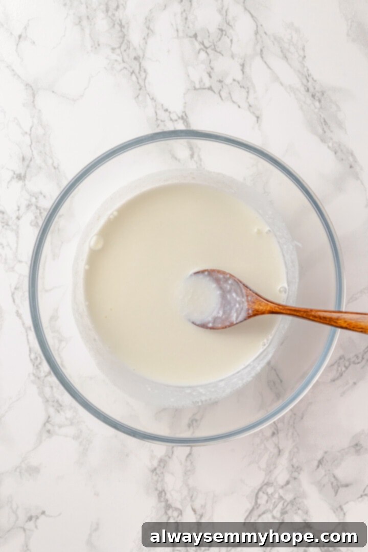 Overhead view of buttermilk mixture for protein pancakes