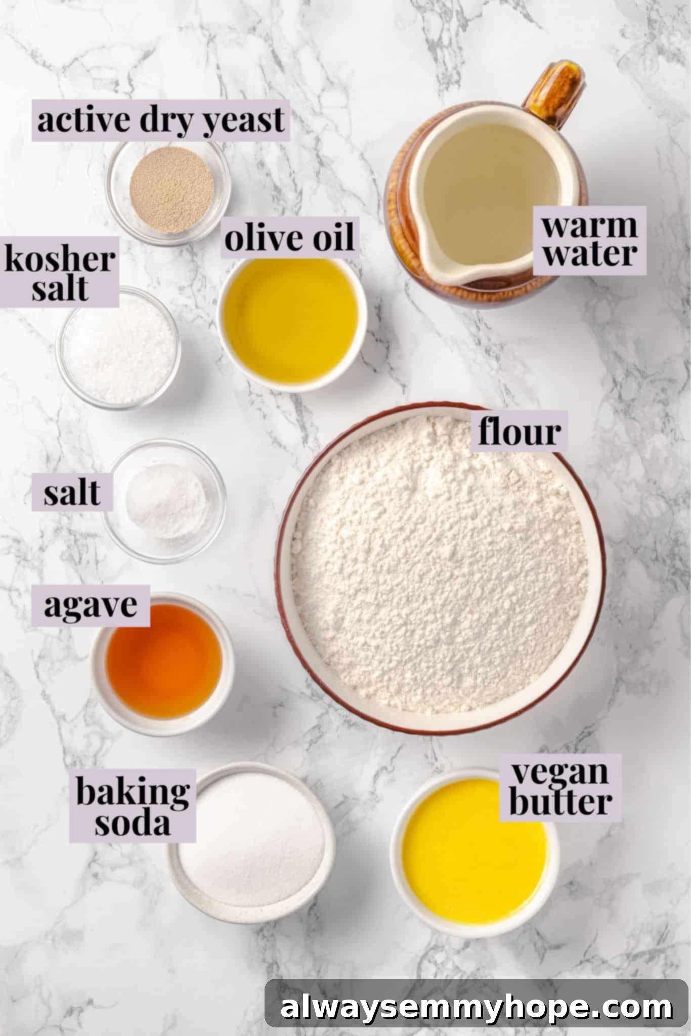 Homemade vegan pretzel bites are the snackable sibling to regular soft pretzels! They're perfect for game day parties and easy to make too. An inviting overhead view of all the essential ingredients laid out for making vegan pretzel bites, each clearly labeled.