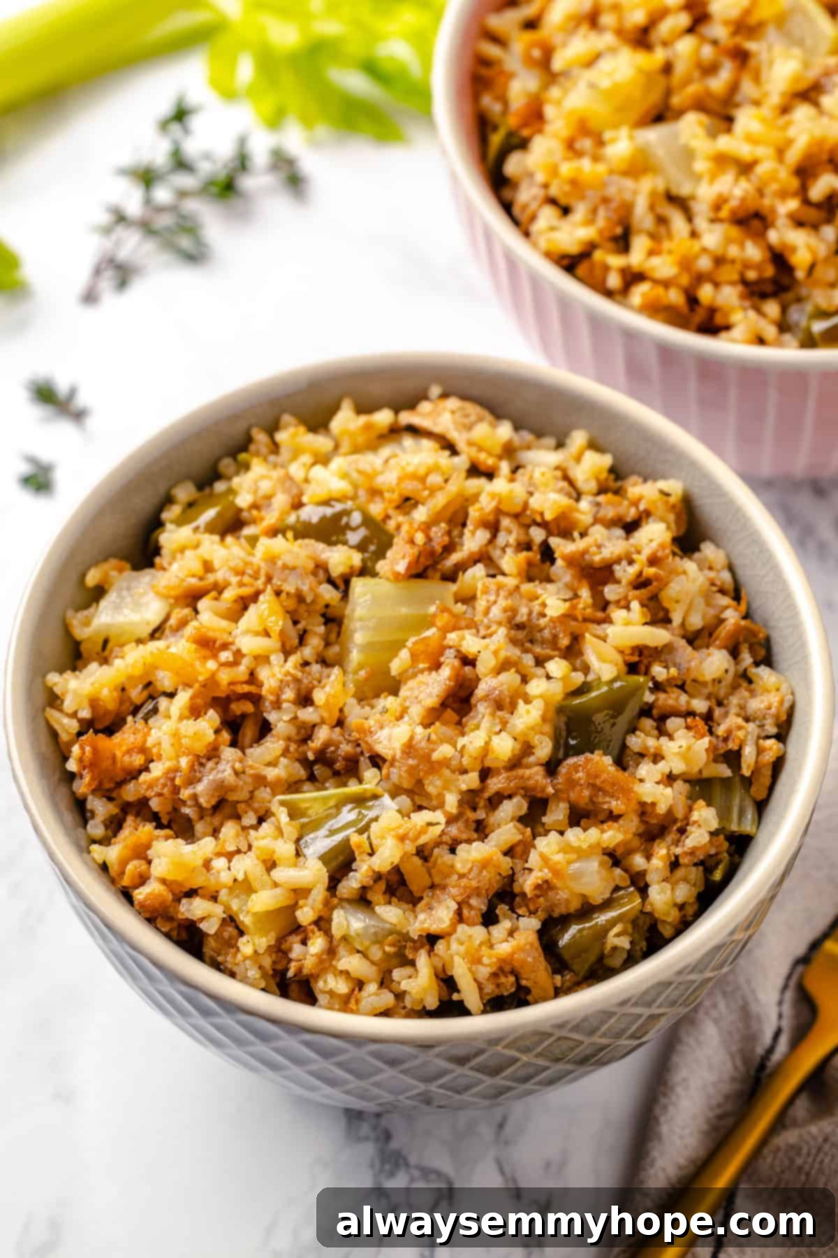 Bowls of vibrantly colored vegan dirty rice, ready to be served and enjoyed.