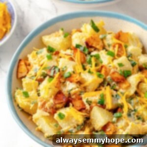 Baked loaded potato salad in bowl