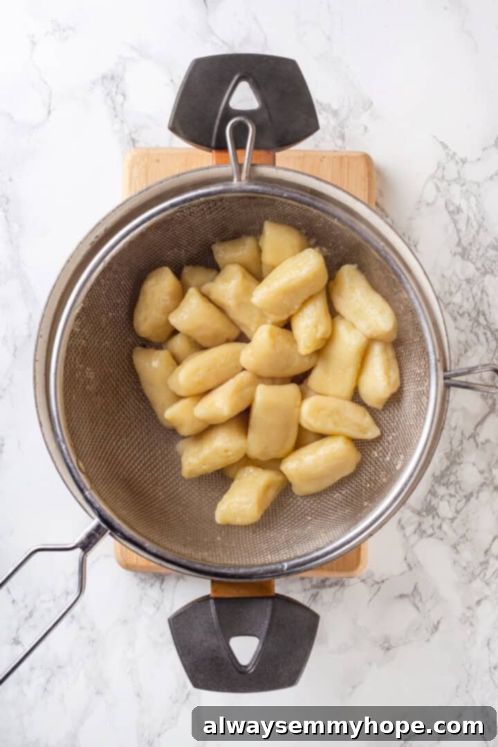 Overhead view of vegan gnocchi in colander
