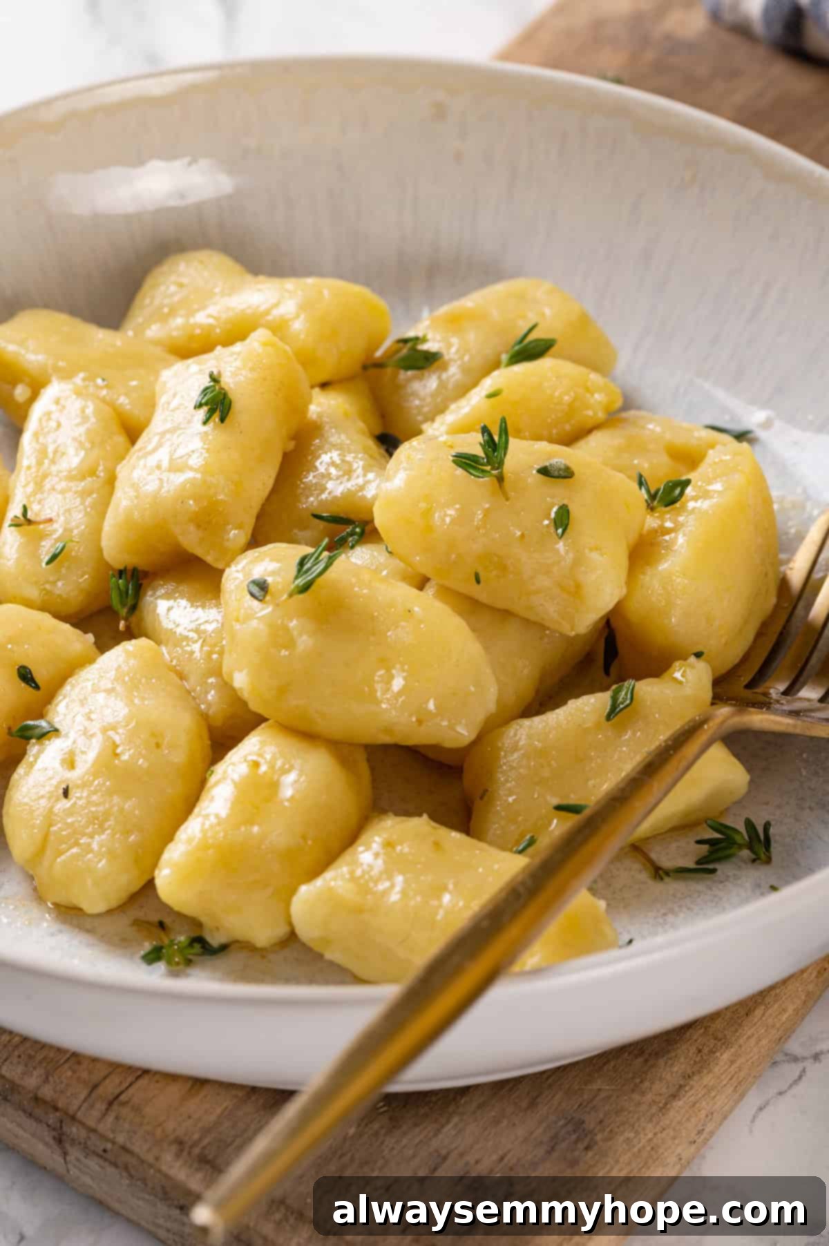 Vegan gnocchi tossed with butter and fresh thyme
