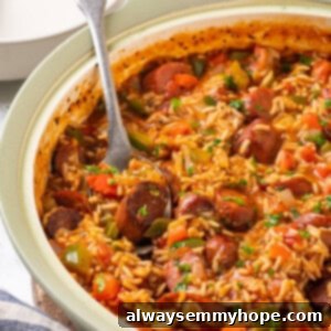 Flavorful Vegan Jambalaya 2 Spoonful of vegan jambalaya in skillet
