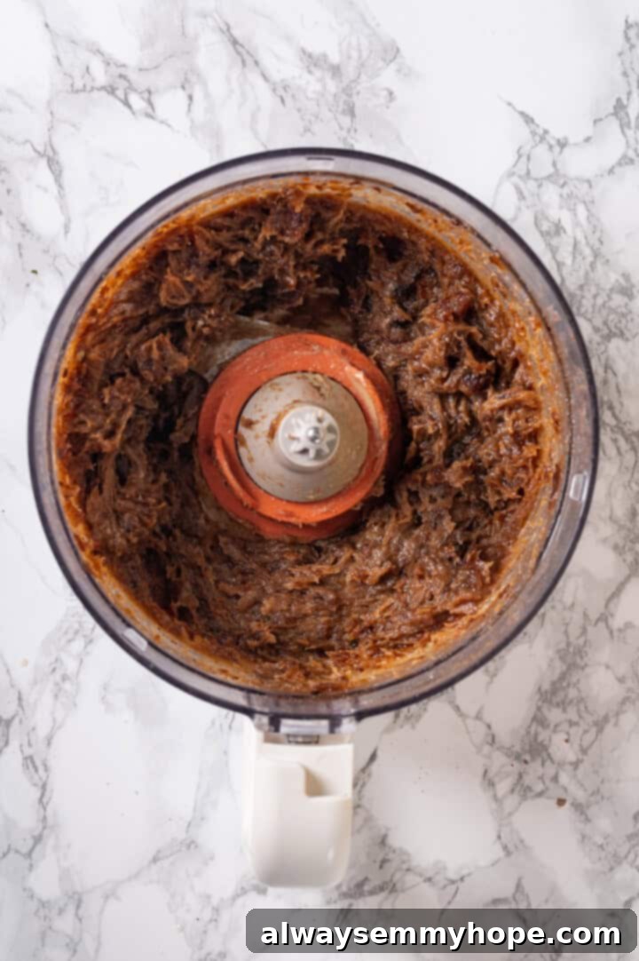 Overhead view of binding mixture for homemade granola bars