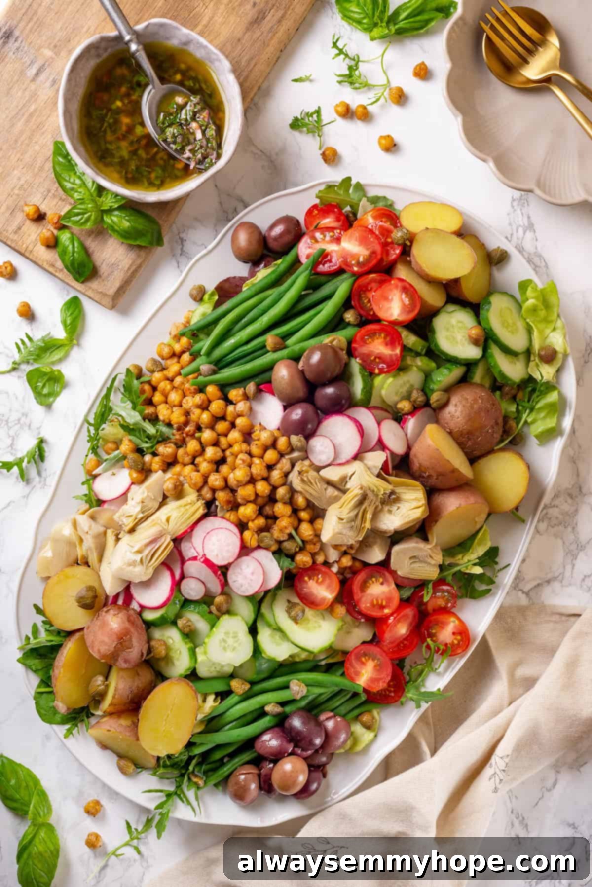 Overhead view of vegan nicoise salad on platter