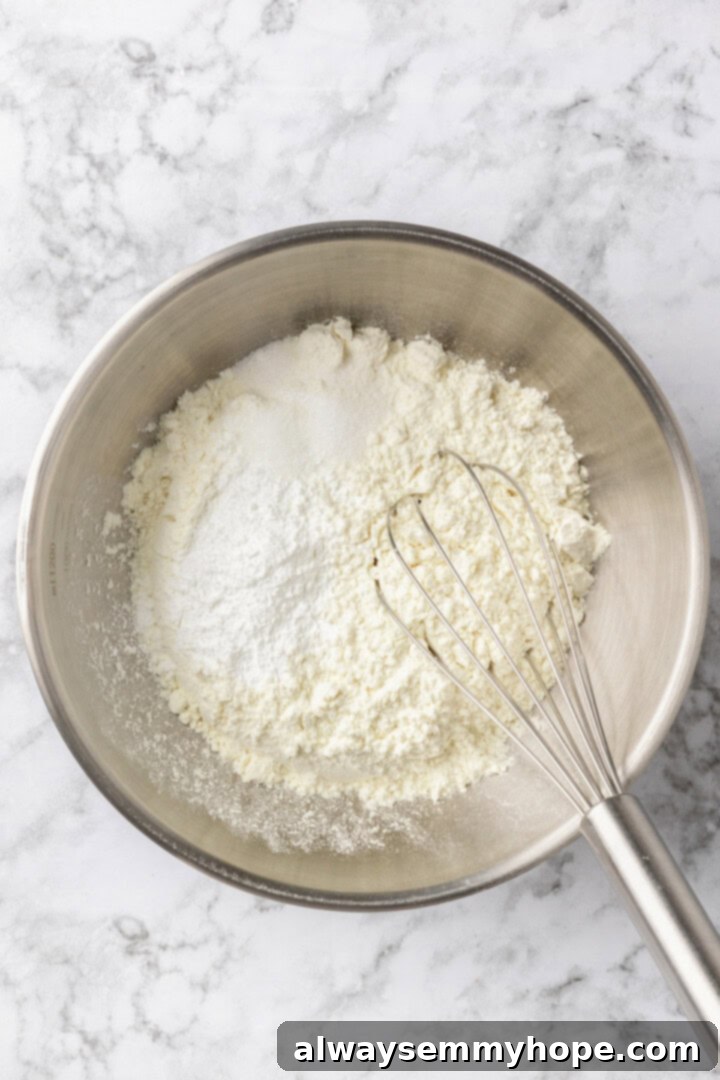 Dry ingredients for sugar cookie crust in mixing bowl