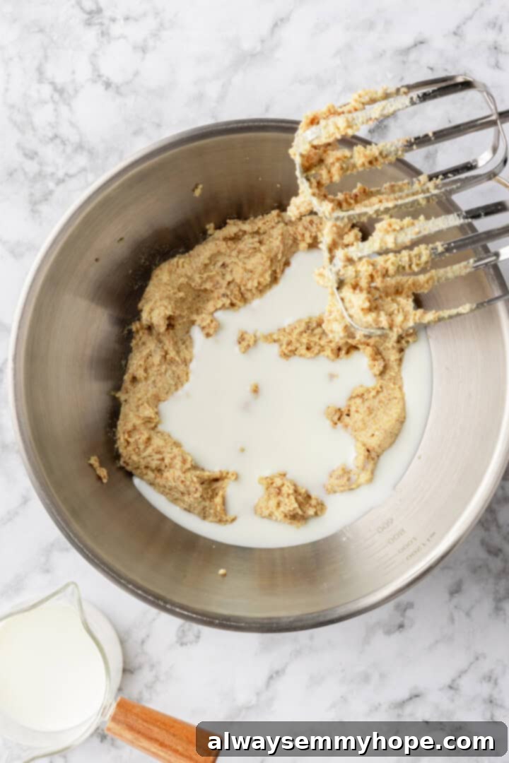 Liquid ingredients added to creamed butter and sugar in mixing bowl