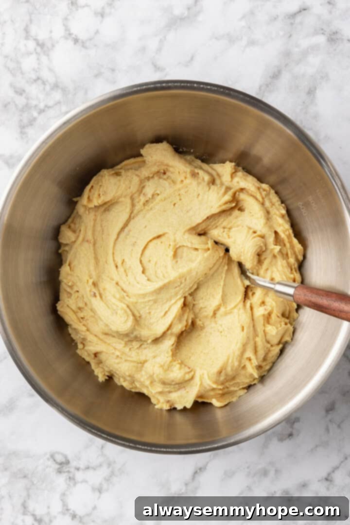 Cookie dough in mixing bowl