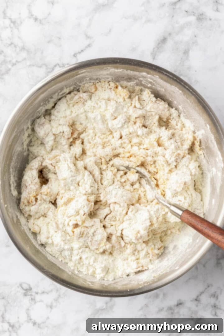 Frosting for fruit pizza in mixing bowl