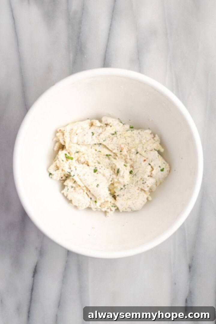 Overhead view of vegan cheese filling in mixing bowl