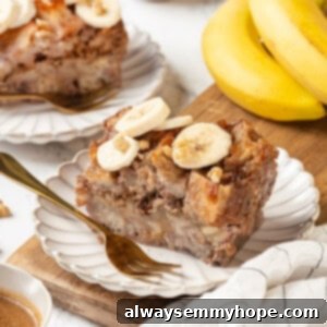 Two plates of banana bread pudding with bananas in background
