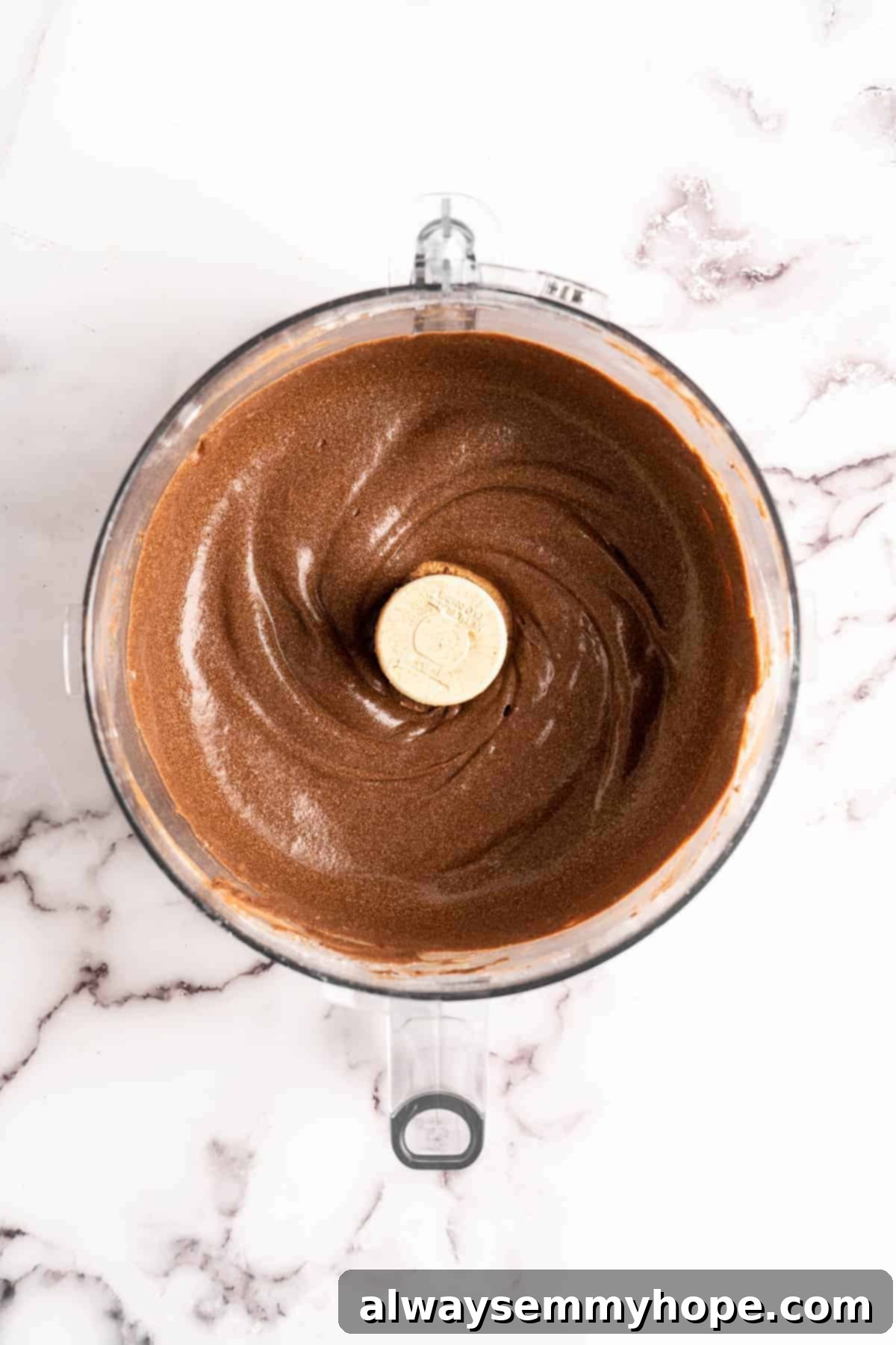 Decadent Chocolate Avocado Ice Cream 7 Chocolate avocado ice cream base in food processor bowl