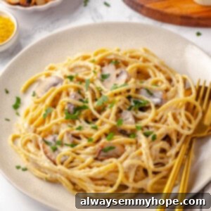 Authentic Italian Carbonara 2 Vegan pasta carbonara on plate with fork and spoon