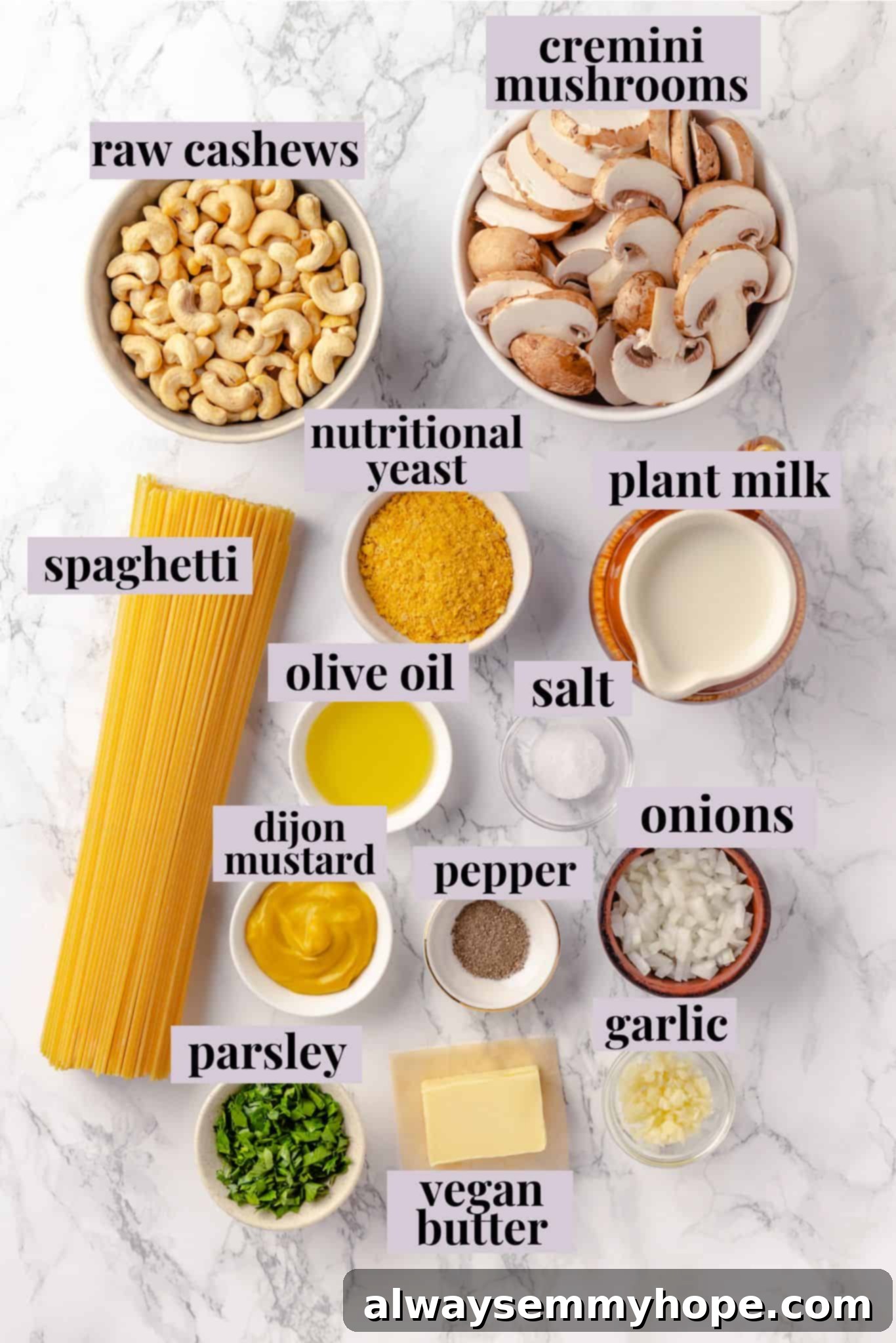 This creamy vegan pasta carbonara is a delicious plant-based alternative to the traditional recipe with mushrooms standing in for the meat! Overhead view of ingredients for pasta carbonara with labels